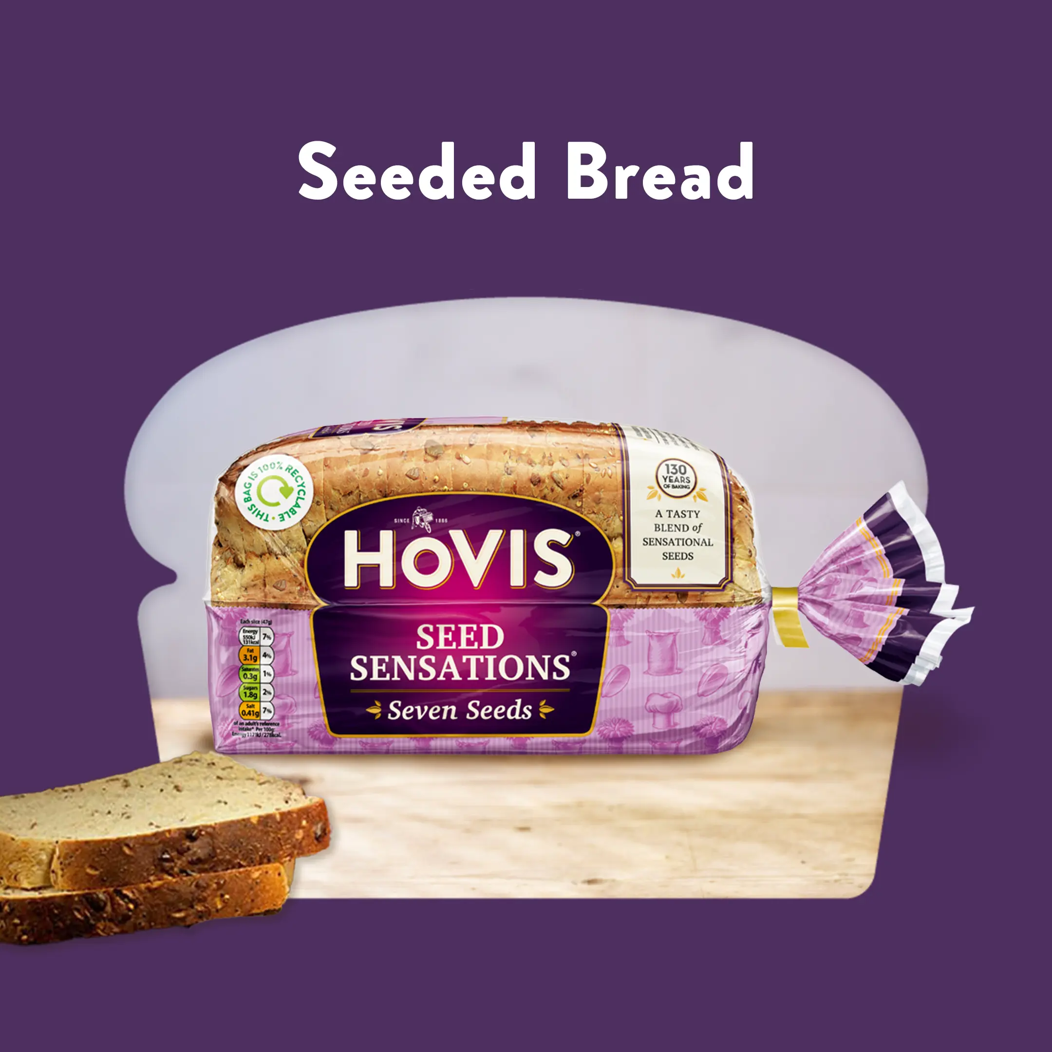 The text reads: Seeded Bread. A Hovis Seed Sensations loaf sits in a purple background and cropped into a loaf shape