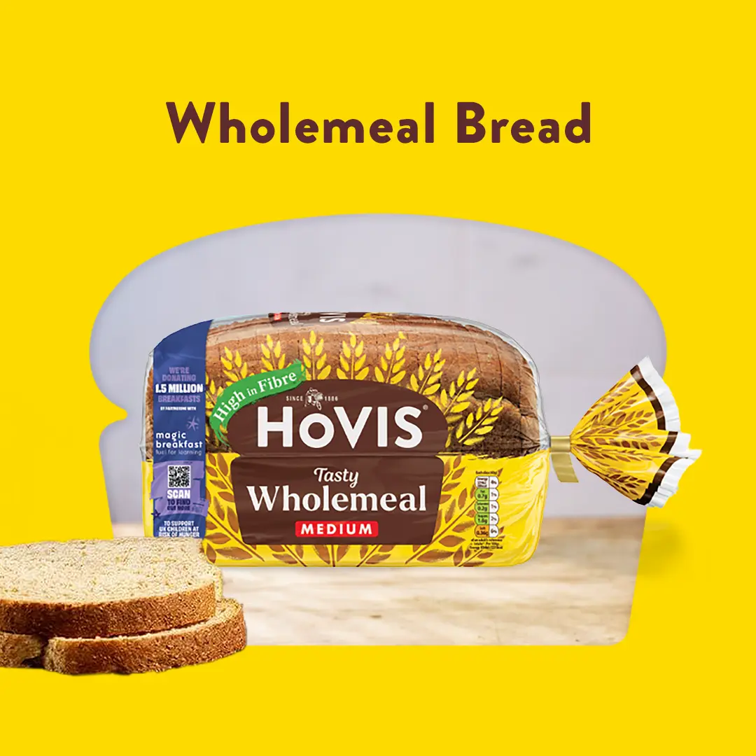 The text reads: Wholemeal bread. A Hovis wheatgerm loaf sits in a red background and cropped into a loaf shape